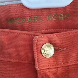 Michael Kors orange slim leg jeans